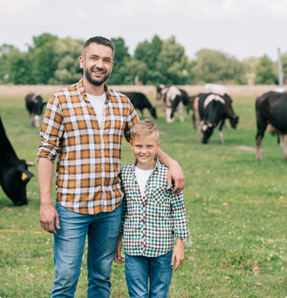father-and-son-smiling-at-camera-while-standing-ne-2022-02-08-03-42-27-utcx